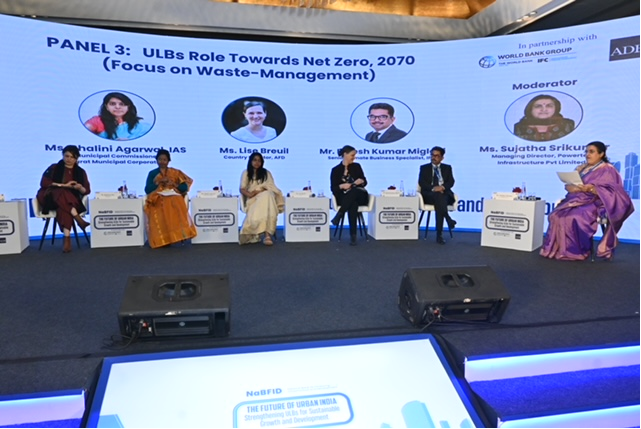 Panel Discussion on ‘ULBs Role Towards Net Zero, 2070 (focus on Waste-Management) Panel Members and Moderators (L-R) Ms. Neha Kumar, Head-South Asia, Climate Bonds Initiative, Ms. Rajasree Ray, Economic Advisor, MoEF&CC, Ms. Shalini Agarwal, IAS, Municipal Commissioner, Surat Municipal Corporation, Ms. Lise Breuil, Country Director, AFD, Mr. Rajesh Kumar Miglani, Senior Climate Business Specialist, IFC, Ms. Sujatha Srikumar, Managing Director, Powertec Infrastructure Pvt Limited