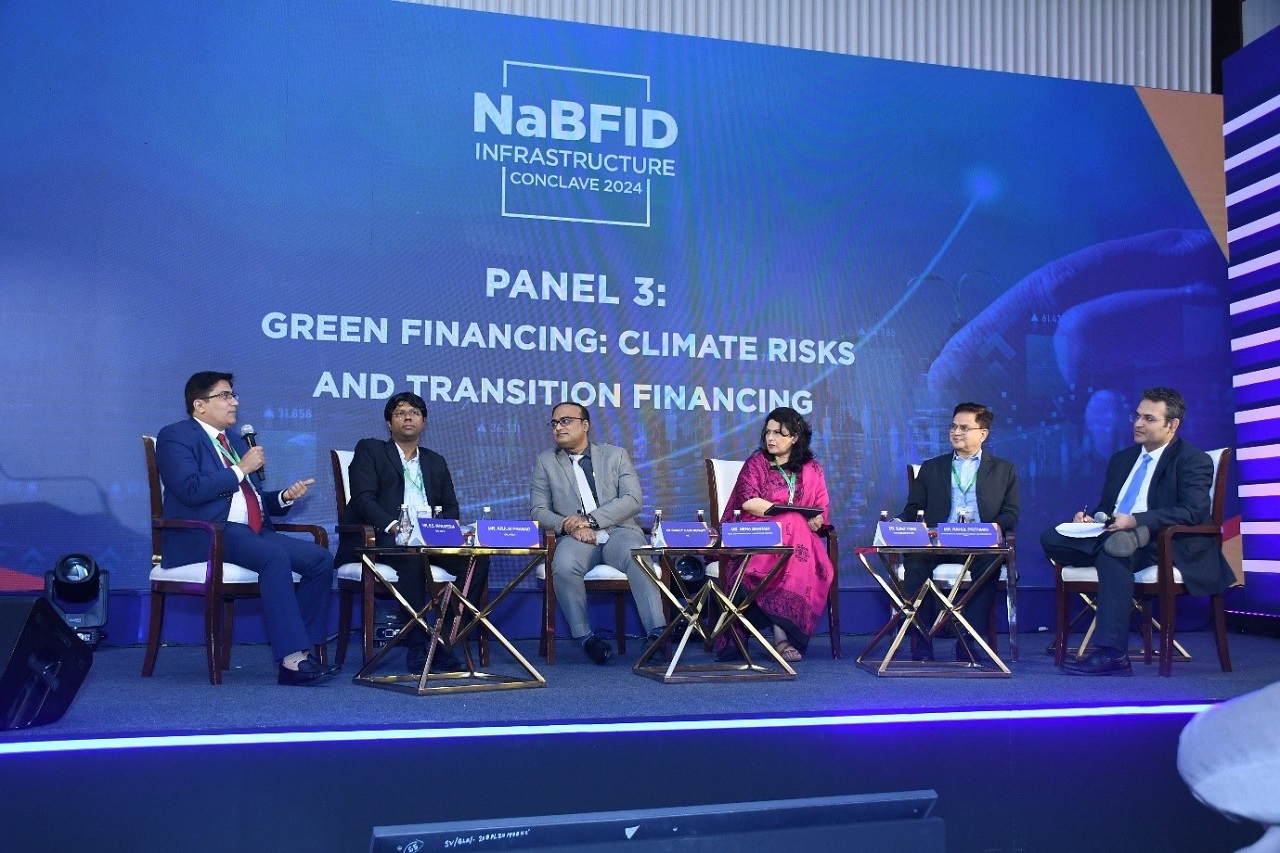Panel Discussion on Green Financing: Climate Risks and Transition Financing at NaBFID Infrastructure Conclave 2024 Panel Members and Moderator (L-R): Mr. B. S. Venkatesha, DMD NaBFID, Mr. Arjun Prasad, GM, IFSCA, Mr. Sandeep Kumar Mohanty, Partner, PwC, Ms. Neha Kumar, Head, South Asia Program, Climate Bonds Initiative, Dr. Sunit Tyagi, CEO, Insolare Pvt. Ltd. and Mr. Rahul Prithiani, Senior Director, Sustainability, Energy and Commodities, CRISIL